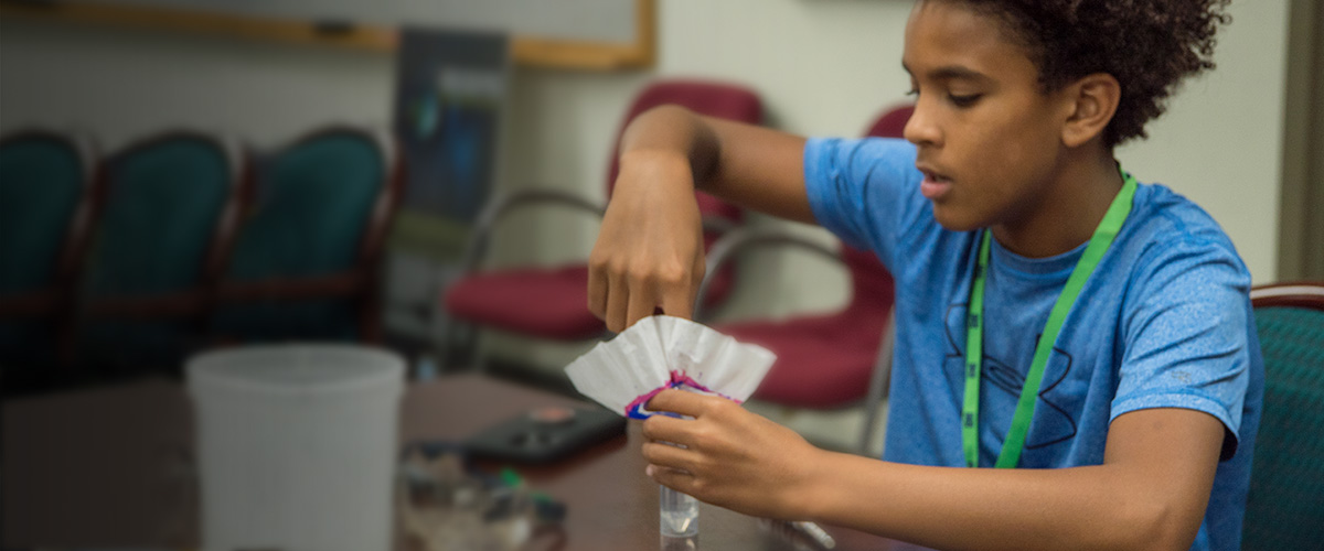 MagLab Summer Camp attendee working on an experiment 