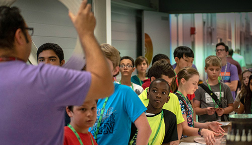 MagLab Staff giving summer camp attendees a tour