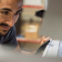 Charlie Sanabria checks on samples in the furnace.