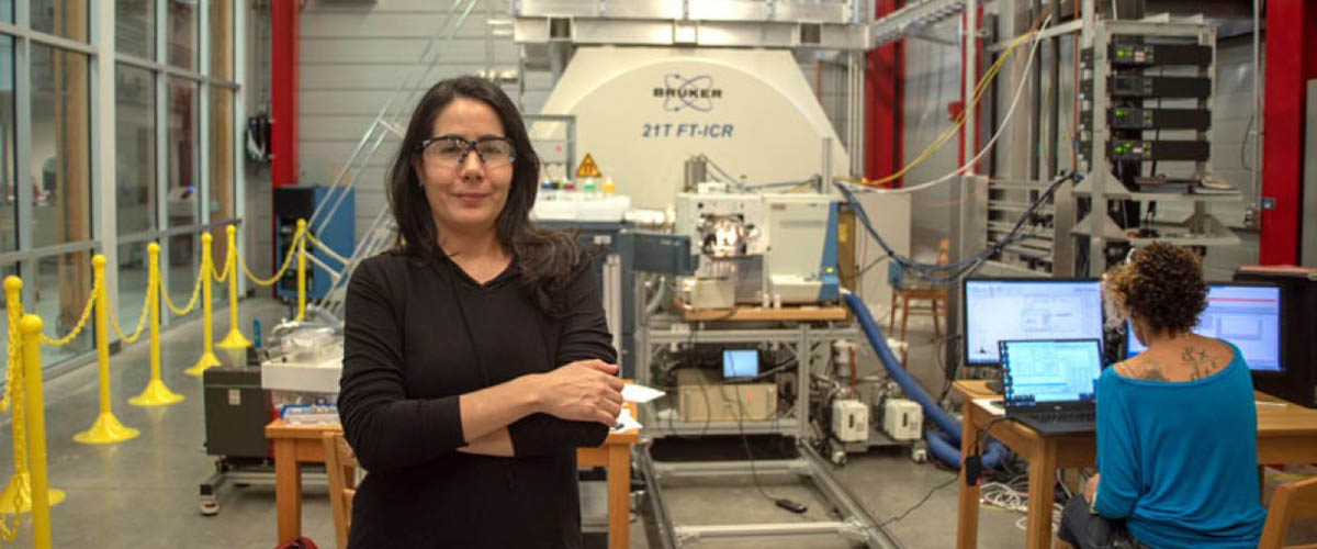 Organic geochemist Isabel Romero (left) tapped the expertise of MagLab chemist Amy McKenna (seated) to run her experiments on ocean sediments impacted by the Deepwater Horizon oil spill.