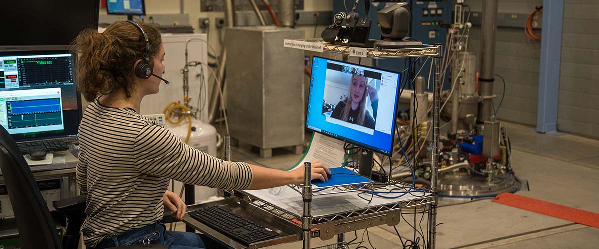 MagLab researcher Elizabeth Green works with Ingrid Stolt remotely