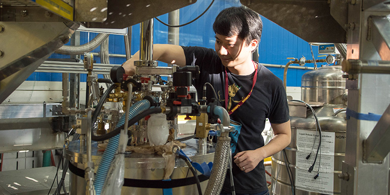 Jia Li, an assistant professor of physics at Brown University, conducting an experiment on graphene, a unique two-dimensional material.