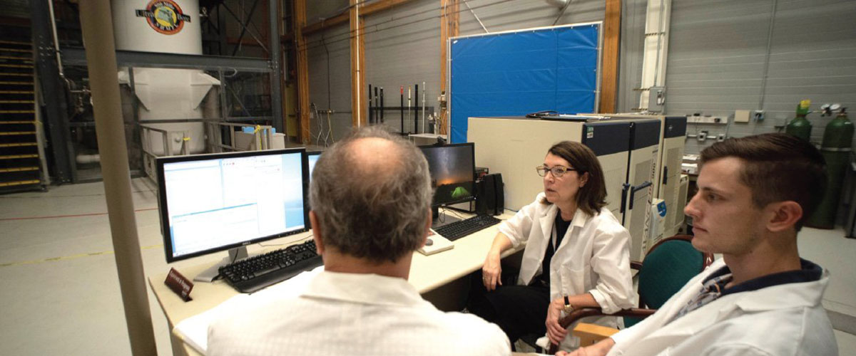 Cathy Levenson runs experiments with National MagLab physicist Victor Schepkin (left) and Florida State University undergraduate Nicholas Kynast on the MagLab' s 21.1-tesla MRI magnet. Cathy Levenson runs experiments with National MagLab physicist Victor Schepkin (left) and Florida State University undergraduate Nicholas Kynast on the MagLab's 21.1-tesla MRI magnet.