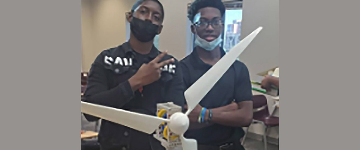 CARE students Devon and Tajari were the first students to finish building their wind turbines during an activity on generators and renewable energy.