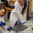 Graduate students Sophie Jermyn (left) and Mary Jean Savitsky (right) working in professor Jamel Ali’s lab at the National High Magnetic Field Laboratory.